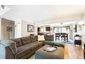 Spacious living room open to the dining area offers comfortable seating at 424 Wright St # 102, Lakewood, CO 80228
