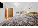 Bright bedroom featuring a large window, ample sunlight, and stylish decor for comfortable living at 2042 Jamaica St, Aurora, CO 80010