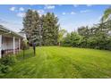 Expansive backyard with a well-maintained lawn, perfect for outdoor activities and relaxation at 3201 S Albion St, Denver, CO 80222