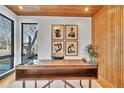 Bright home office featuring custom wood accents, stylish decor, and a large window at 1100 S Gilpin St, Denver, CO 80210