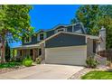 Beautiful two-story home featuring a well-maintained lawn and a spacious two-car garage at 5914 S Kearney St, Centennial, CO 80111