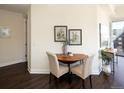 Cozy dining area with wood table and chairs at 1650 Fillmore St # 504, Denver, CO 80206