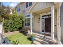 Charming front porch with seating area, perfect for enjoying the outdoors at 1522 Chimney Peak Dr, Castle Rock, CO 80109
