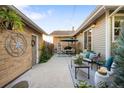 Private backyard with a patio, an outdoor dining area, and an enclosed fence at 2026 S Lincoln St, Denver, CO 80210