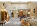 Spacious open concept living room connects seamlessly to the kitchen and dining area at 7780 W 87Th Dr # E, Arvada, CO 80005