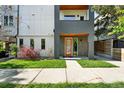 Contemporary home with modern architectural details and landscaped front yard at 2830 W 32Nd Ave, Denver, CO 80211