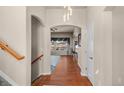 Bright entryway with hardwood floors and view to Gathering room at 9965 E 143Rd Way, Brighton, CO 80602