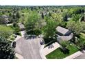 Charming home nestled in a lush, tree-filled neighborhood on a quiet cul-de-sac at 6432 E Jamison S Cir, Centennial, CO 80112