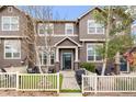 Charming townhome with a cozy front yard, inviting entrance, and lovely curb appeal at 3502 Nez Perce Trl, Castle Rock, CO 80109