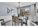 Bright dining room with access to a private balcony at 2665 S Sheridan Ct, Lakewood, CO 80227