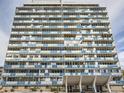 Striking exterior view of a high-rise building showcases its unique architecture and design at 1155 Ash St # 202, Denver, CO 80220