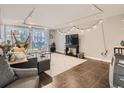 Cozy living room features stylish decor, comfortable seating, and natural light, perfect for relaxation at 1155 Ash St # 202, Denver, CO 80220