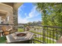 Cozy balcony featuring outdoor seating with sunny neighborhood views at 11250 Florence St # 5C, Commerce City, CO 80640