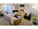 Cozy living room with fireplace, modern furnishings and neutral tones at 6380 S Boston St # 191, Greenwood Village, CO 80111