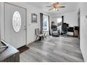 Inviting living room features wood floors and natural light at 244 S Fetzer St, Byers, CO 80103