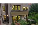 Beautiful modern townhouse with large windows and a cozy patio view at 8041 E 29Th Ave, Denver, CO 80238