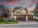 Charming home with a three-car garage and stone accents at 10954 W 100Th Way, Broomfield, CO 80021