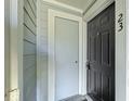 Close-up of the front door and address number of the unit at 5550 W 80Th Pl # 23, Arvada, CO 80003