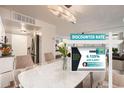 Bright dining area adjacent to the kitchen, featuring a modern table and chairs near mortgage promotion at 1250 N Humboldt St # 201, Denver, CO 80218