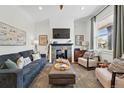 Bright living room featuring a fireplace and neutral decor at 2955 N Columbine St, Denver, CO 80205
