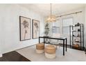 Stylish home office with dark wood floors, decorative lighting, and a neutral color scheme at 16549 Prospect Ln, Broomfield, CO 80023
