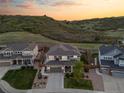 An aerial view showing the proximity of the home to open space and greenbelt and neighborhood homes at 1133 Lucky Ct, Castle Rock, CO 80109