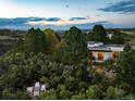 Overhead view of the home and property showing the private back yard and outdoor seating area at 3823 Castle Butte, Castle Rock, CO 80109