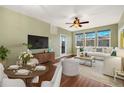 Bright living room with hardwood floors, large windows, and modern decor at 9633 E 5Th Ave # 10208, Denver, CO 80230
