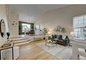 Spacious living room with hardwood floors and modern decor at 2903 S Walden Way, Aurora, CO 80013