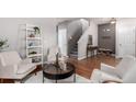Inviting living room with stylish decor, neutral palette, and natural light, perfect for relaxation at 8421 E 29Th Ave, Denver, CO 80238