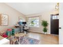 Bright room featuring a work space, large window, and stylish decor at 1462 Hyacinth Way, Superior, CO 80027