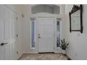 Inviting foyer with neutral decor, tiled flooring, and large windows providing ample natural light at 787 Eldorado Dr, Superior, CO 80027
