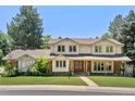 Inviting two-story home with a well-manicured lawn and traditional design at 4810 W 102Nd Pl, Westminster, CO 80031