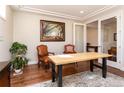 Inviting home office with wood floors, natural light, comfortable seating, and a relaxing atmosphere at 1665 Avery Way, Castle Rock, CO 80109