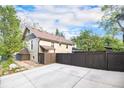 Paved driveway and fenced backyard offering parking and privacy at 2507 9Th St, Boulder, CO 80304