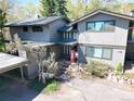 Charming two-story home with inviting entryway and well-maintained landscaping at 1172 Juniper Ave, Boulder, CO 80304