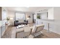 Bright and inviting living room featuring stylish furniture and an open layout at 1476 W Dakota Ave, Denver, CO 80223