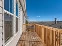 Wooden deck overlooking city views at 3338 S Canosa Ct, Englewood, CO 80110