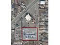 Aerial view of a commercial property outlined in red on S Wolff St, with a proposed E-TU-C designation at 971 S Wolff St, Denver, CO 80219