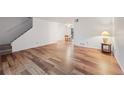 Spacious living room featuring hardwood floors and an open floor plan at 3855 S Monaco St # 176, Denver, CO 80237