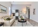 Cozy living room featuring neutral tones and comfortable seating arrangements at 4868 Collingswood Dr, Highlands Ranch, CO 80130