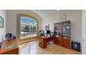 Bright home office with a large window that provides plenty of natural light and views of the neighborhood at 1647 Harris Ct, Erie, CO 80516