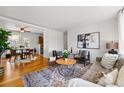 Cozy living room with hardwood floors, stylish furnishings, and an open layout at 1335 S Holly St, Denver, CO 80222