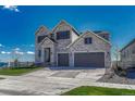 Beautiful two-story home with a stone facade, three gables, and a spacious three-car garage at 6860 S Yantley Ct, Aurora, CO 80016