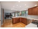 Spacious kitchen with stainless appliances, ample counter space, and an open layout at 7844 S Eudora Cir, Centennial, CO 80122