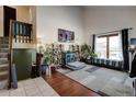 Vaulted ceilings and hardwood floors in the living room at 1621 Flemming Dr, Longmont, CO 80501