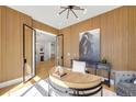 Sophisticated office space with wood paneling, elegant desk, and comfortable seating at 754 S York St, Denver, CO 80209