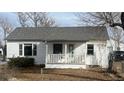 Charming single story home with front porch at 252 S Owens St, Byers, CO 80103