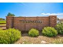 Welcome to WindSong! Beautiful brick sign with manicured landscaping at 15499 Kearney St, Brighton, CO 80602