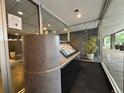 Well-lit lobby area with a directory and Amazon Key service for package delivery and secure entry at 888 N Logan St # 2C, Denver, CO 80203